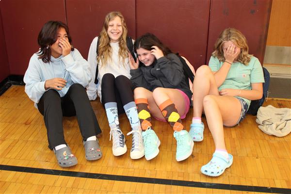Middle School students wearing crocs and fun socks